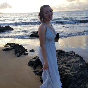 Light blue, long, sheer dress.